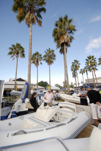 Santuary Cove exhibits amongst the Palm Trees © Sanctuary Cove International Boat Show http://www.sanctuarycoveboatshow.com.au/